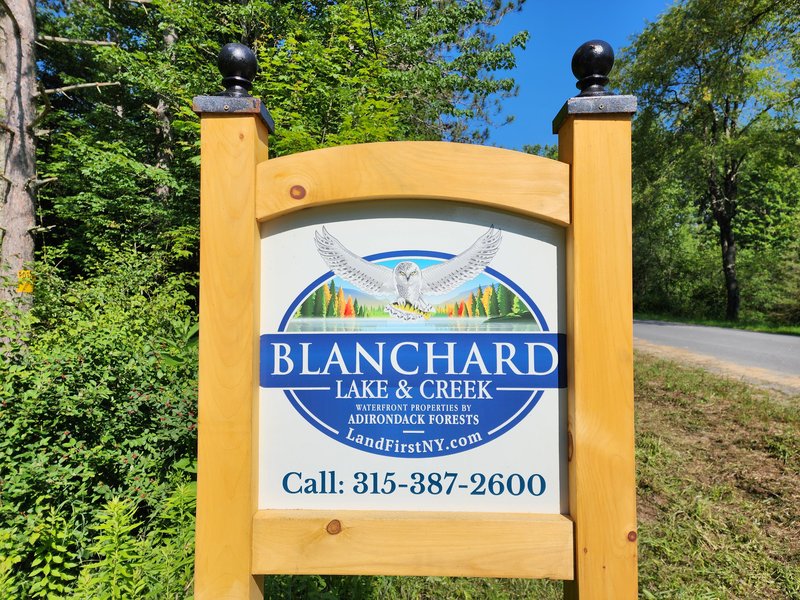 Blanchard Lake and Creek for sale waterfront properties by Adirondack NY Forests real estate sign